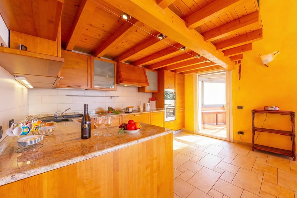 Family Apartment, 2 Bedrooms, Balcony (Lugano Panoramica) | Private kitchen | Full-size fridge, microwave, oven, stovetop