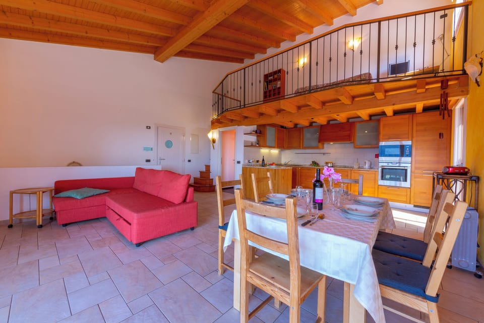 Family Apartment, 2 Bedrooms, Balcony (Lugano Panoramica) | Living area | 22-inch flat-screen TV with cable channels, TV, DVD player