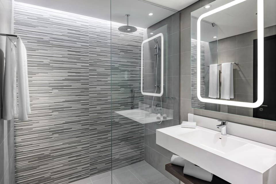 Shower, eco-friendly toiletries, hair dryer, bathrobes