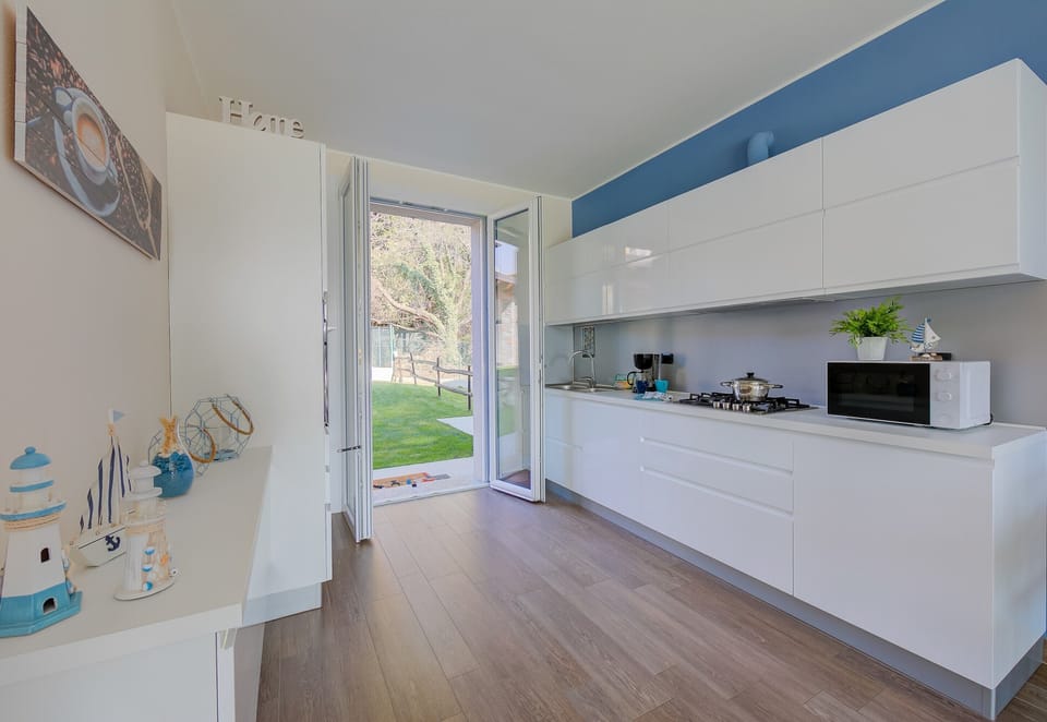 Family Villa, Multiple Bedrooms, 2 Bathrooms, Mountainside (Villa Il Gelsomino Bellavista) | Private kitchen | Full-size fridge, microwave, oven, stovetop