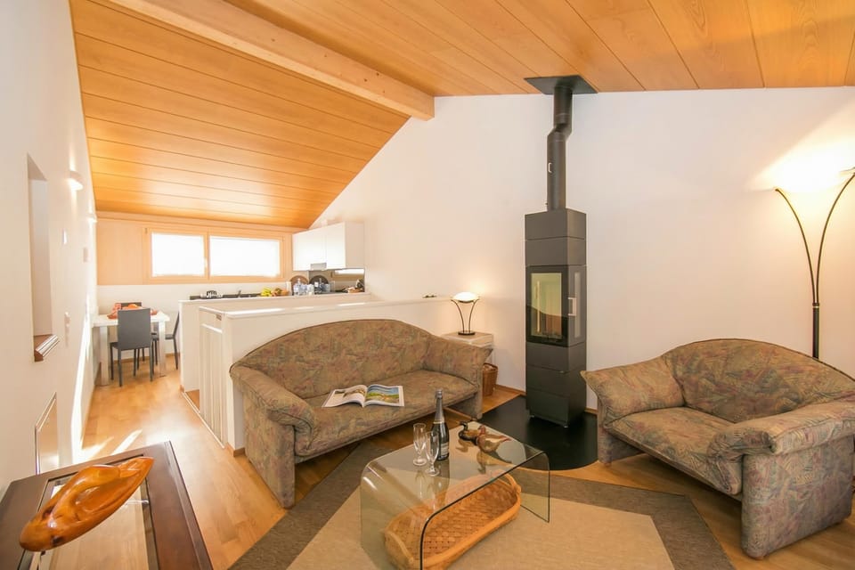 Family Townhome, 2 Bedrooms, Balcony, Mountainside (Ca' Melin with Balcony & Fireplace) | Living area | Fireplace