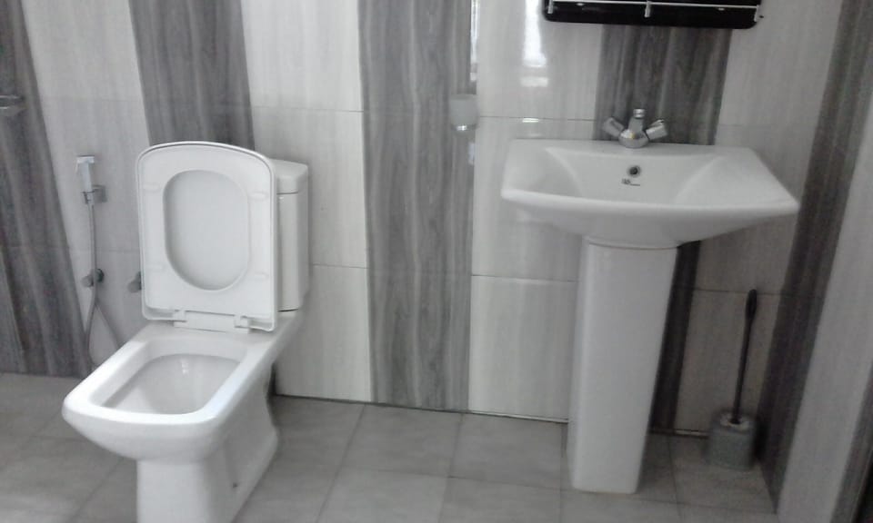 Family House | Bathroom | Shower, slippers, towels