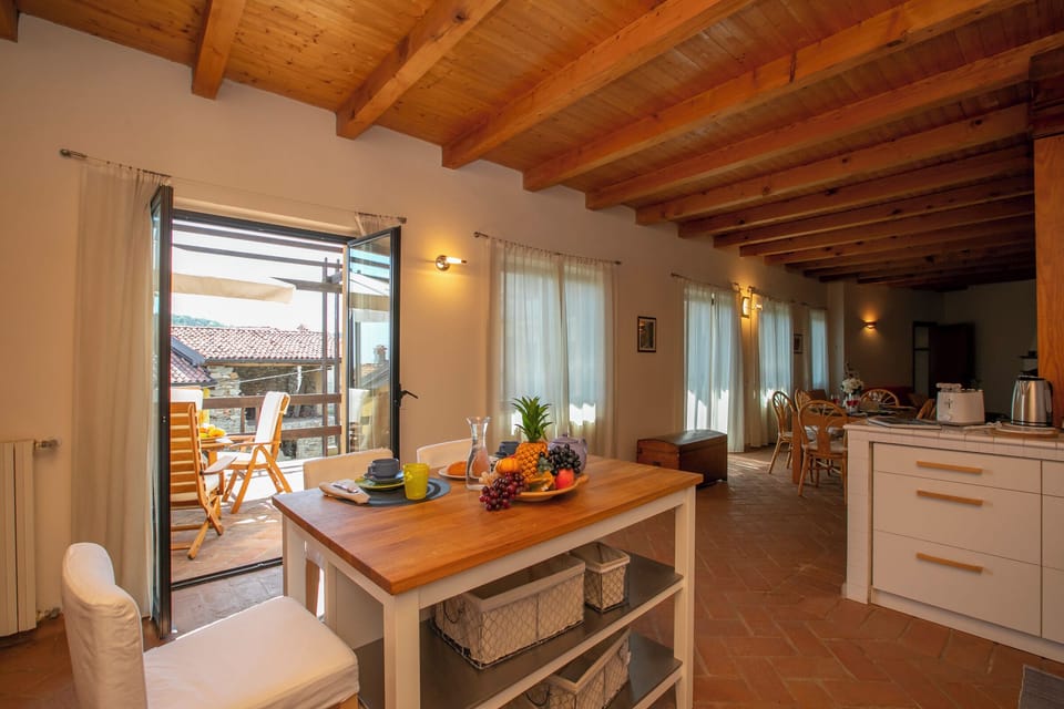 Family Townhome, Multiple Bedrooms, Mountainside (La Casa nel Borgo Lake View) | Private kitchen | Full-size fridge, microwave, oven, stovetop