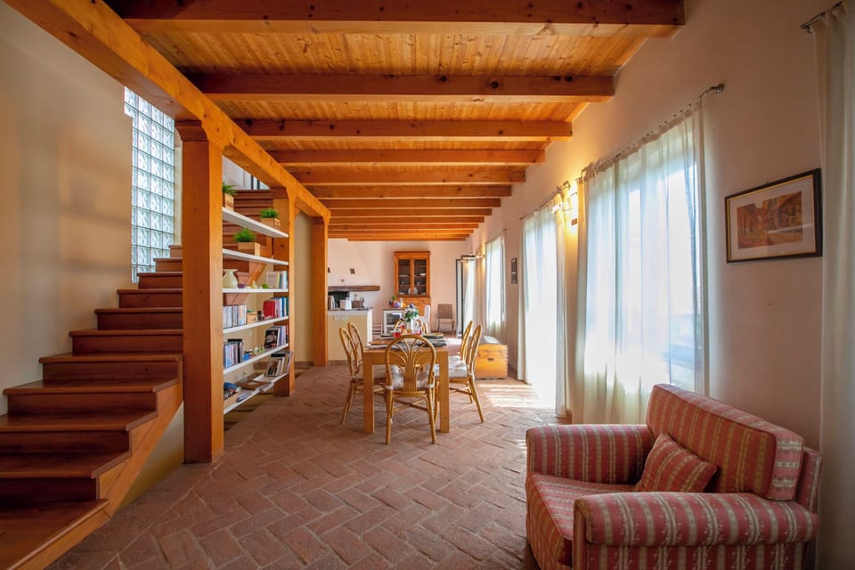 Family Townhome, Multiple Bedrooms, Mountainside (La Casa nel Borgo Lake View) | Living room | 21-inch Smart TV with cable channels, DVD player
