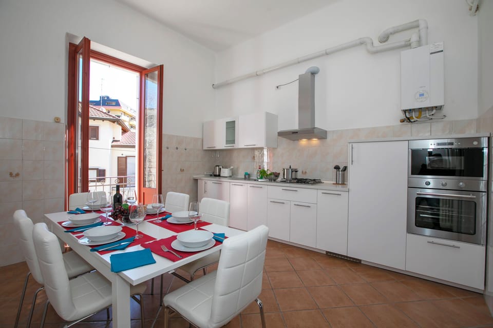 Family Apartment, 2 Bedrooms, Balcony, Lakeside (Residenza Gardenia - Lake View) | Private kitchen | Coffee/tea maker, full-size fridge, microwave, oven