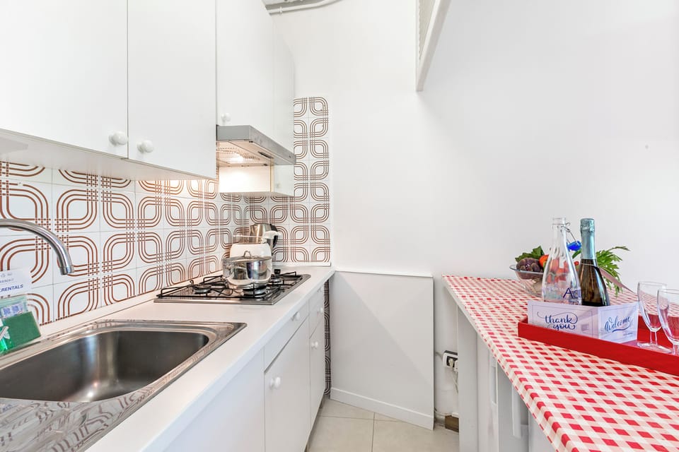Family Apartment, 2 Bedrooms, 2 Bathrooms (Rododendro Rosso) | Private kitchen | Oven, stovetop, dishwasher, toaster