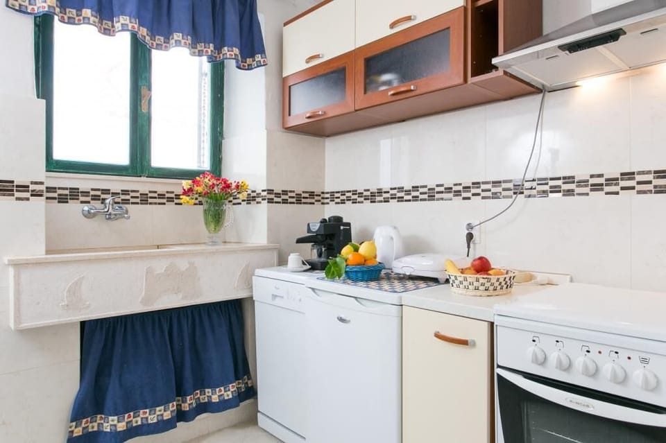 Apartment (Three Bedroom Apartment) | Private kitchen | Fridge, coffee/tea maker, electric kettle