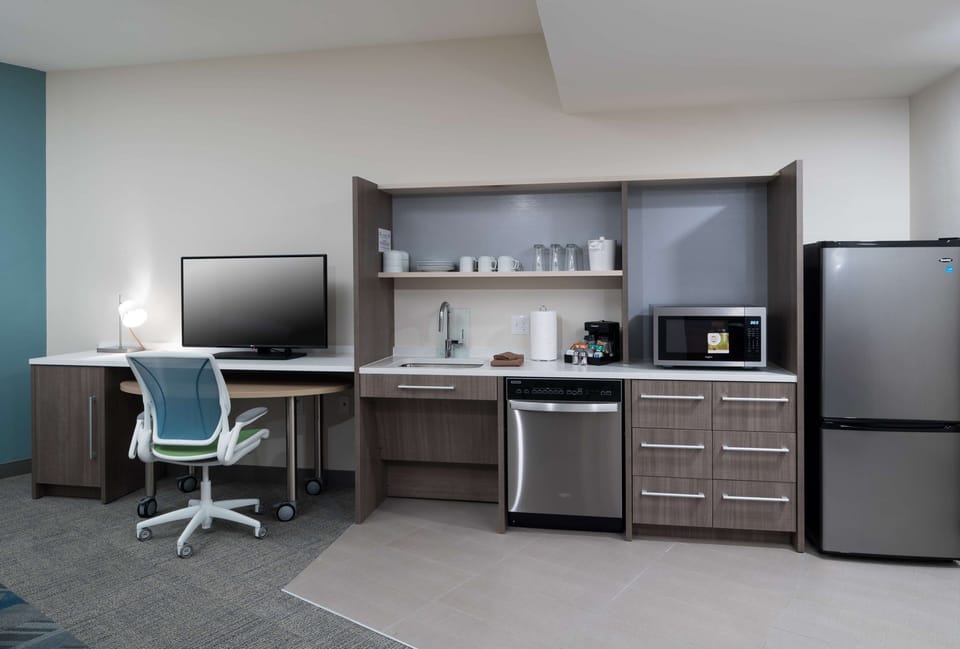 Suite, 2 Queen Beds, Accessible (Roll-In Shower) | Desk, laptop workspace, blackout drapes, iron/ironing board