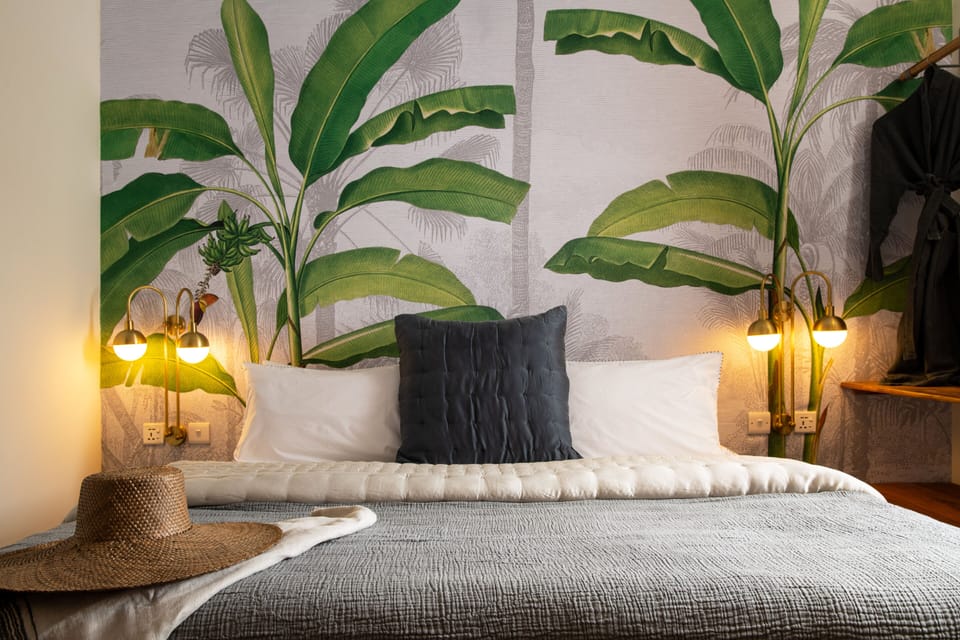 Deluxe Double Room | Minibar, in-room safe, individually decorated, blackout drapes