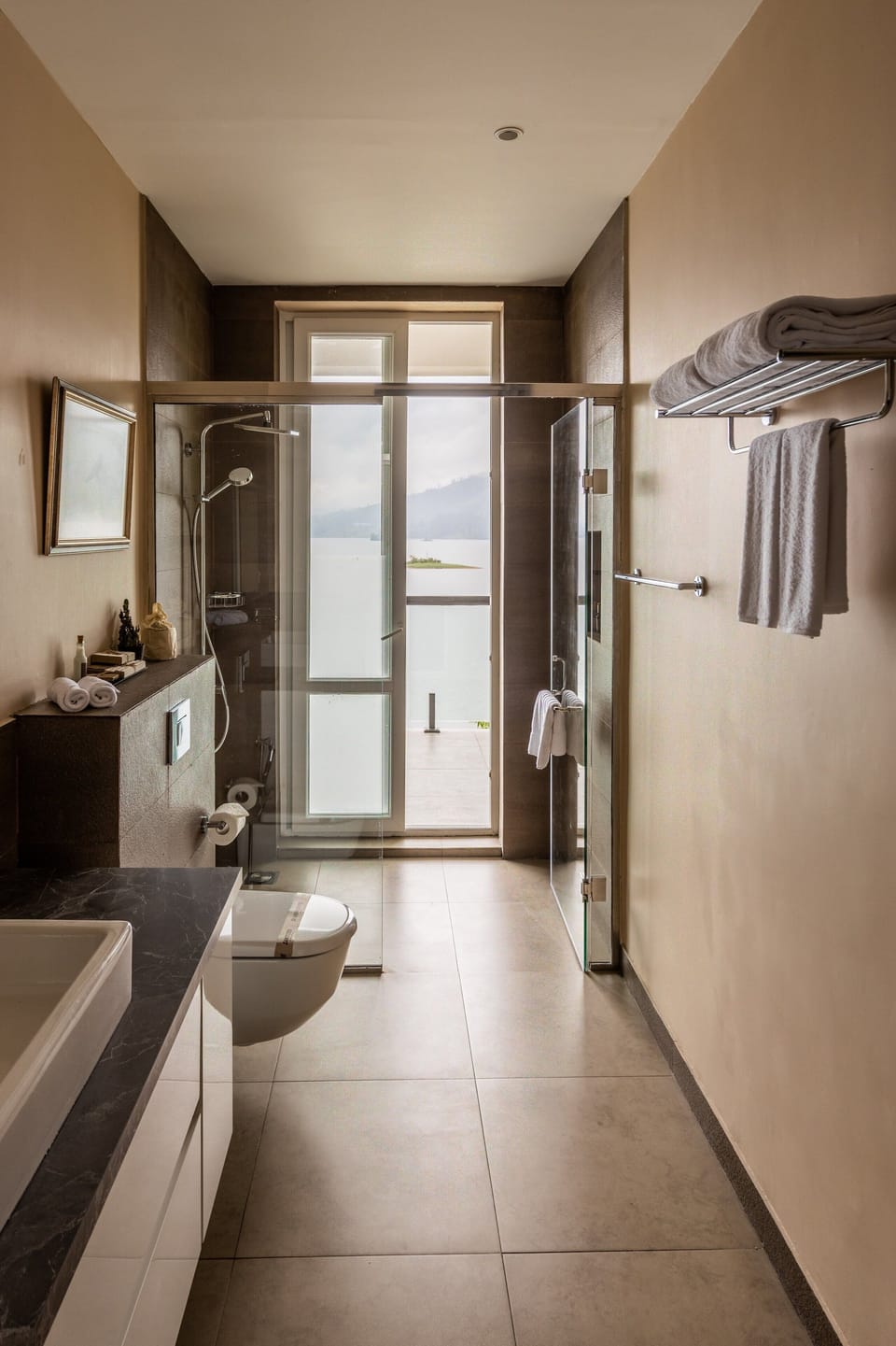 Shower, rainfall showerhead, designer toiletries, hair dryer