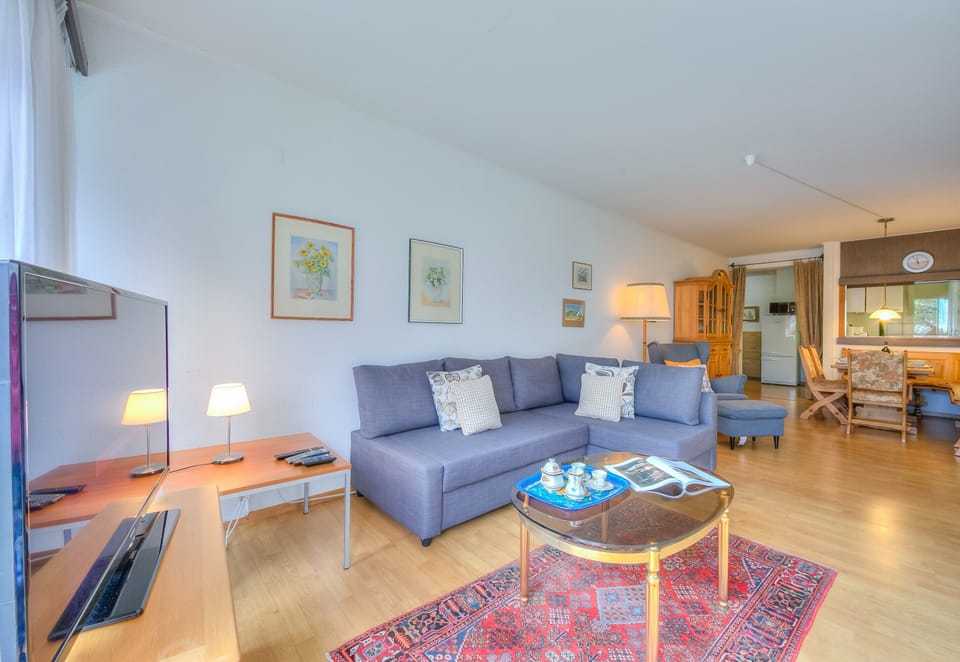 Family Apartment, 1 Bedroom, Microwave, Lakeside (Casa Sibylle with Sauna and Pool) | Living area | 21-inch flat-screen TV with digital channels