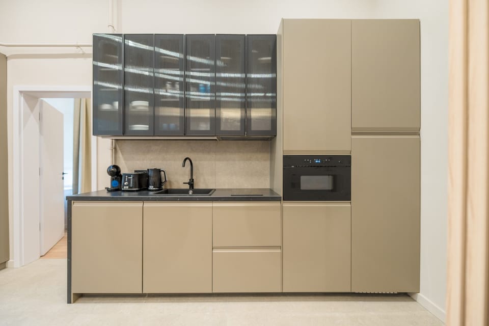 Comfort Apartment | Private kitchen | Full-size fridge, microwave, oven, stovetop