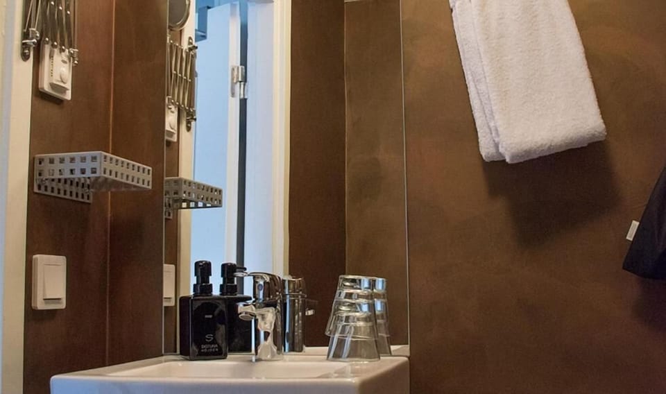 Shower, hair dryer, bathrobes, towels