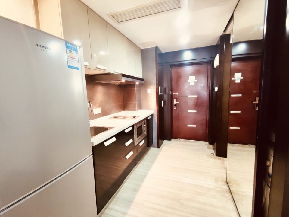 Full-size fridge, microwave, stovetop, electric kettle