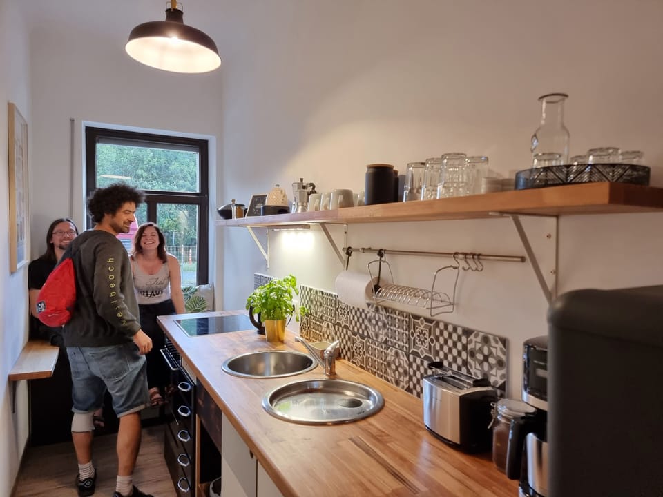 Deluxe Apartment, Multiple Beds, Kitchen, Ground Floor | Private kitchen | Stovetop, cookware/dishes/utensils