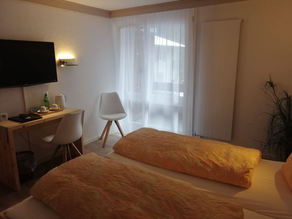 Superior Double Room with Eiger View and Balcony | In-room safe, free WiFi, bed sheets