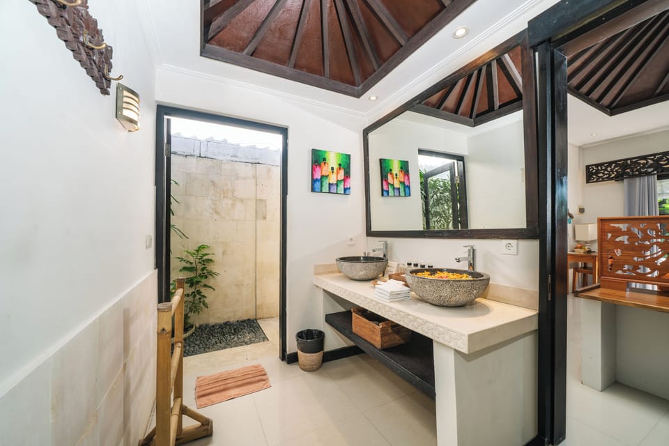 Suite, 1 Bedroom | Bathroom | Shower, hair dryer, bathrobes, slippers