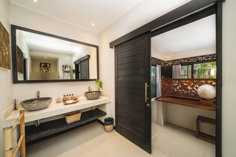 Suite, 1 Bedroom | Bathroom | Shower, hair dryer, bathrobes, slippers