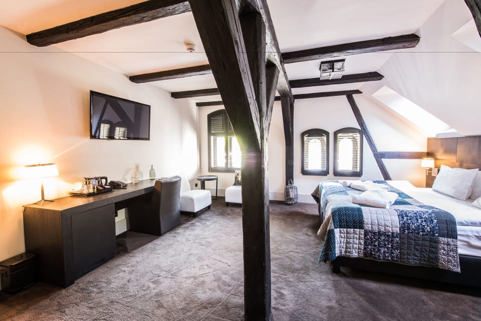 Royal Suite | Premium bedding, in-room safe, desk, blackout drapes
