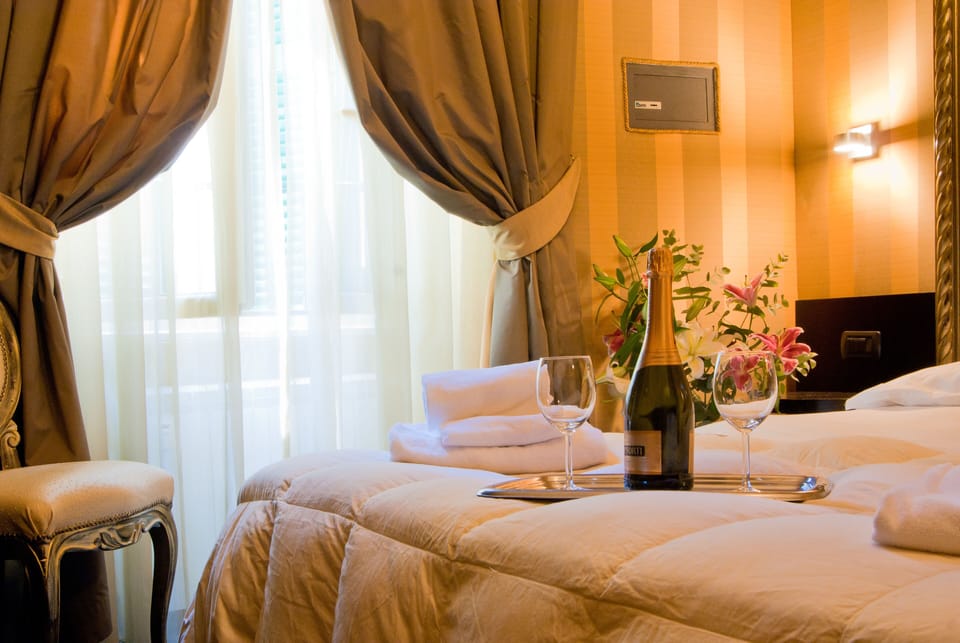 Double or Twin Room | Minibar, in-room safe, desk, blackout drapes