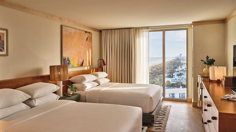 Premium bedding, pillowtop beds, minibar, in-room safe
