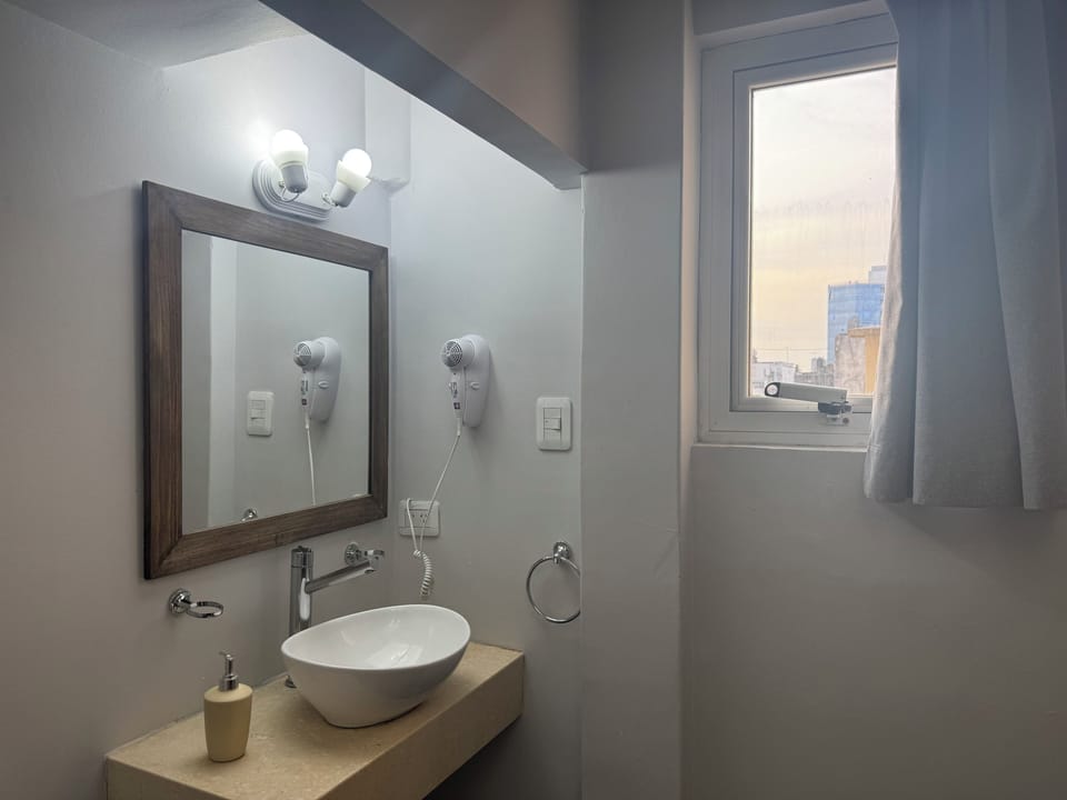 Premium Quadruple Room | Bathroom | Shower, free toiletries, towels