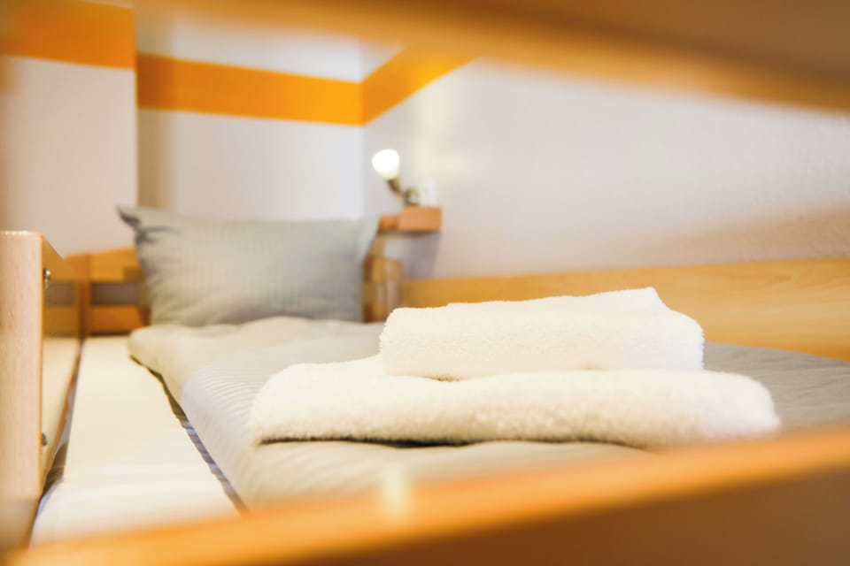 Hypo-allergenic bedding, in-room safe, blackout drapes