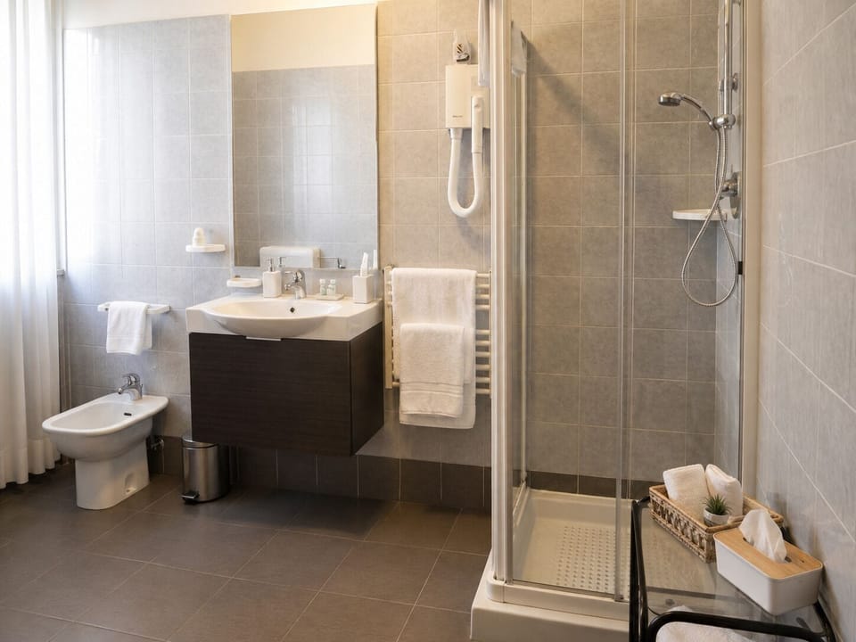 Superior Double Room | Bathroom | Free toiletries, slippers, towels