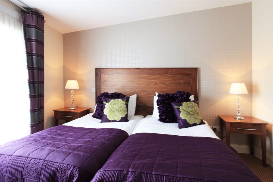 Deluxe Twin Room, 2 Twin Beds | Individually decorated, individually furnished, desk, blackout drapes