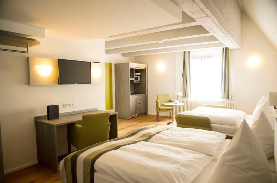 Classic Quadruple Room, 1 Queen Bed with Sofa bed, City View | Hypo-allergenic bedding available, minibar, desk, laptop workspace