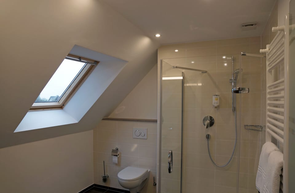 Comfort Studio | Bathroom | Shower, designer toiletries, hair dryer, bathrobes