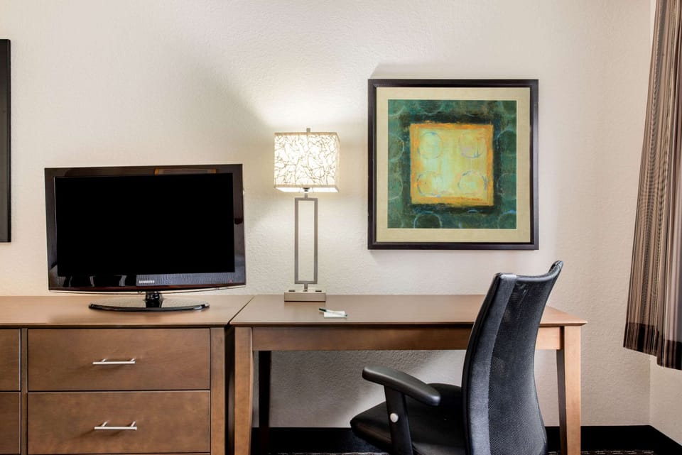 Pillowtop beds, desk, blackout drapes, iron/ironing board