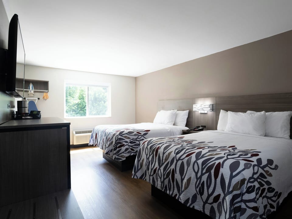 Iron/ironing board, cribs (free), rollaway beds (surcharge), WiFi (free)