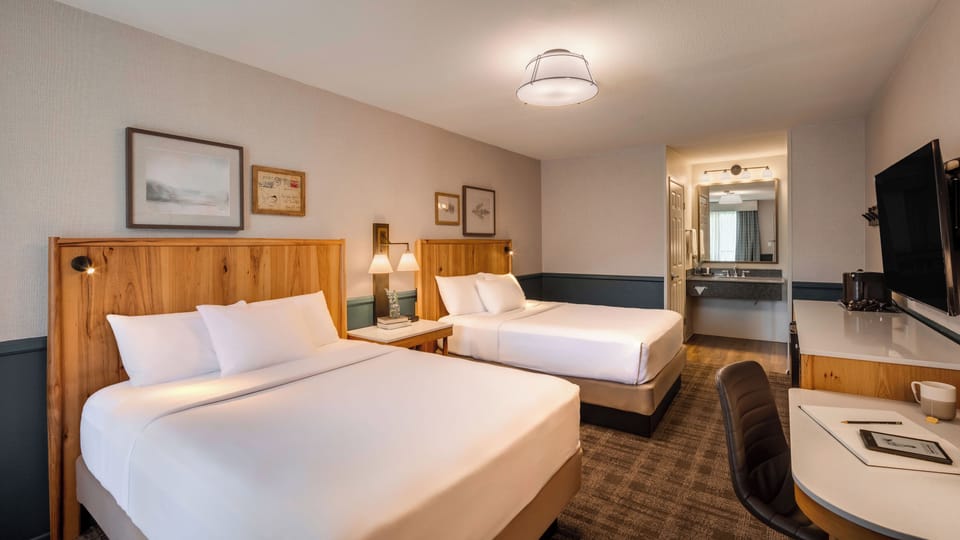 Premium bedding, pillowtop beds, desk, laptop workspace