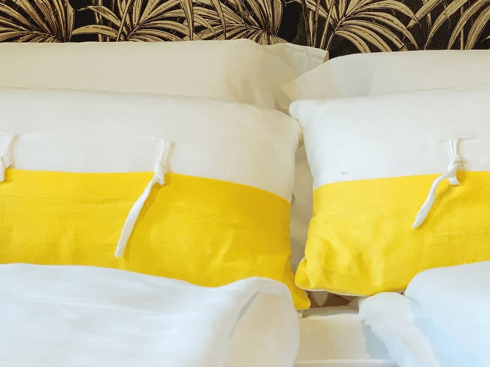 Comfort Room | Down comforters, individually decorated, individually furnished, desk