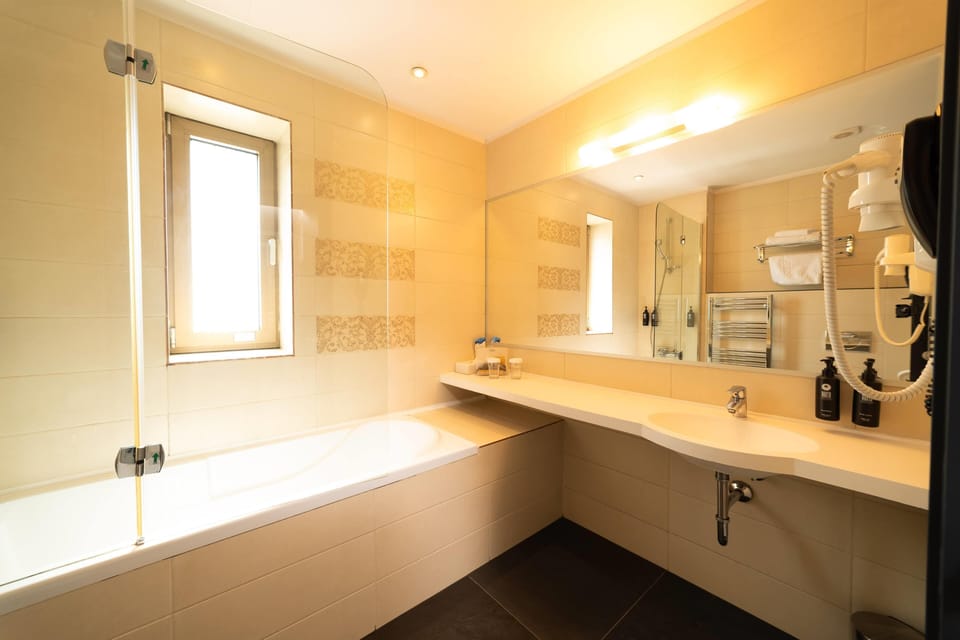 Shower, free toiletries, hair dryer, bathrobes