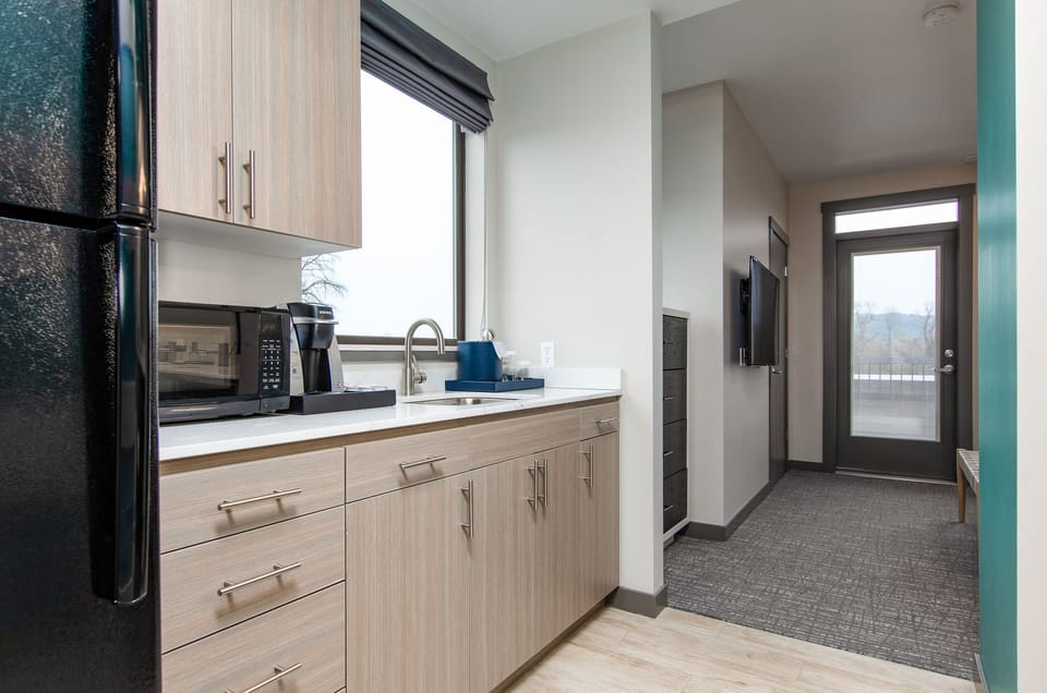 Premium bedding, memory foam beds, desk, laptop workspace