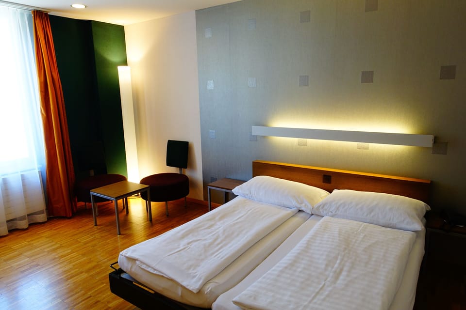 Economy Double Room | Down comforters, minibar, in-room safe, individually decorated