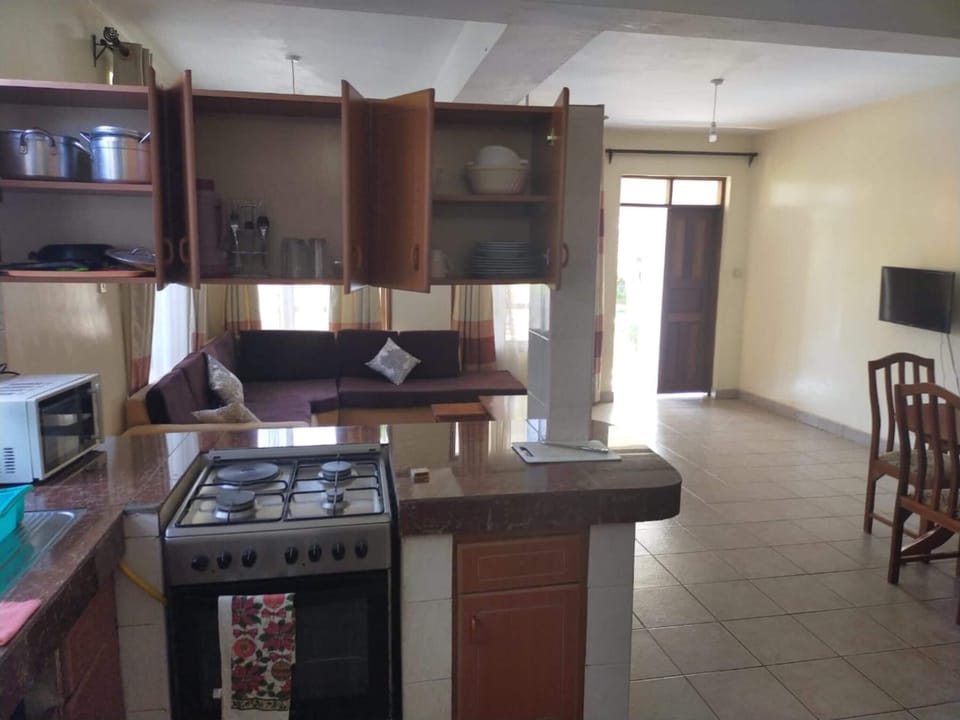Full-size fridge, microwave, dining tables