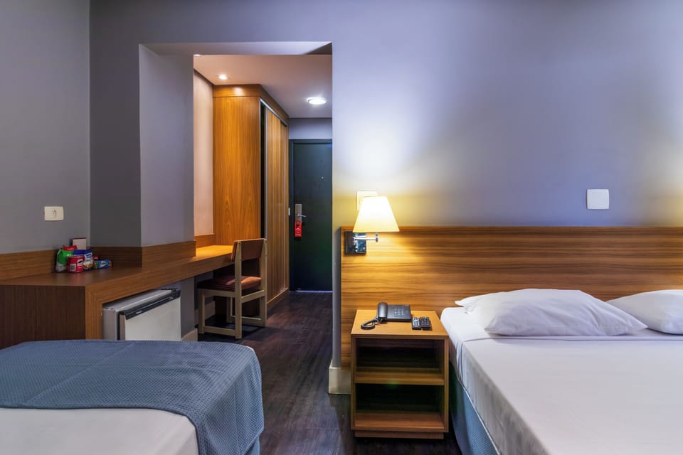Superior Triple Room | Minibar, desk, blackout drapes, free WiFi