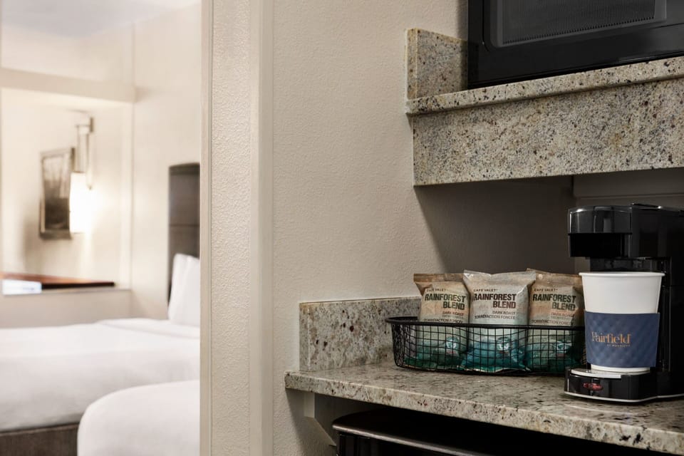 Suite, Multiple Beds | Private kitchen | Fridge, coffee/tea maker