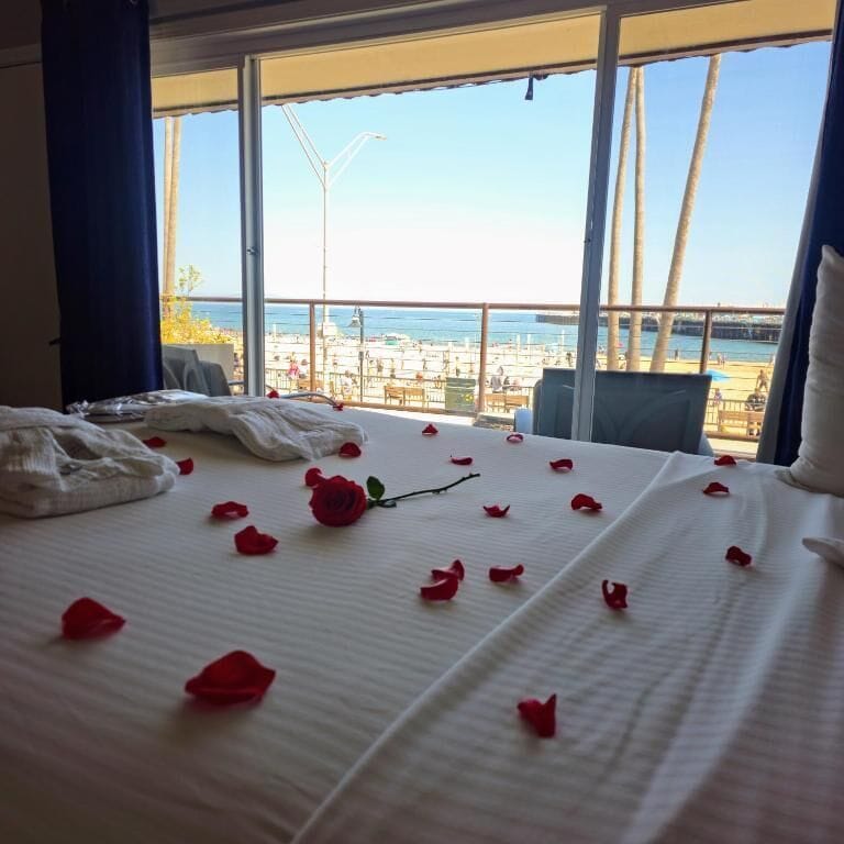Ocean Front, Two Queen Beds, Shared Balcony | Free WiFi, bed sheets