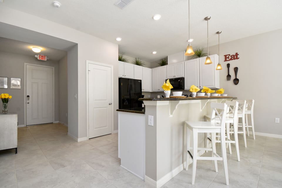 Townhome, 4 Bedrooms | Private kitchenette | Full-size fridge, microwave, oven, stovetop