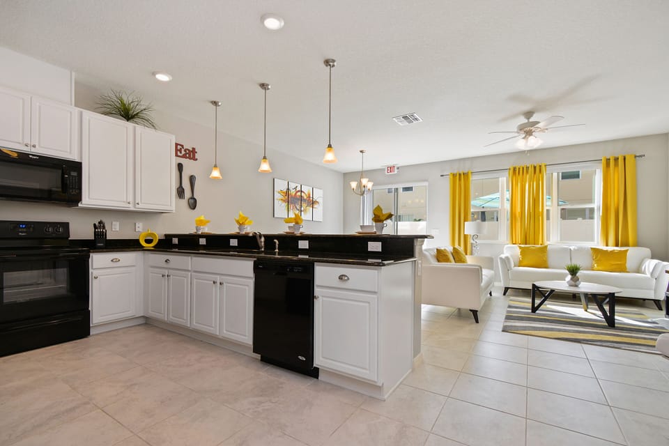 Townhome, 4 Bedrooms | Private kitchenette | Full-size fridge, microwave, oven, stovetop