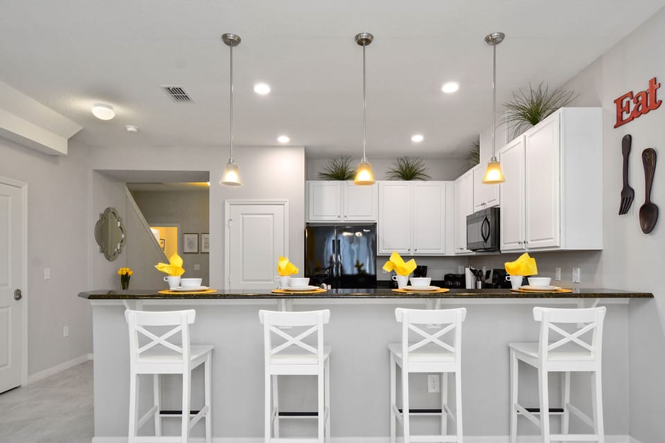 Townhome, 4 Bedrooms | Private kitchenette | Full-size fridge, microwave, oven, stovetop