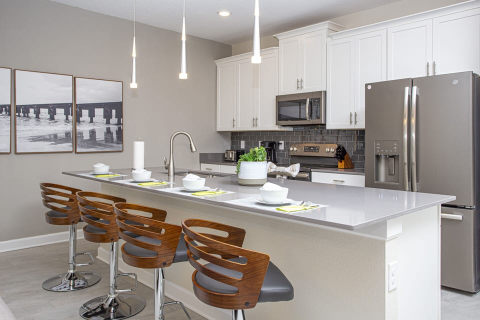 Townhome, 4 Bedrooms | Private kitchen | Full-size fridge, microwave, oven, stovetop