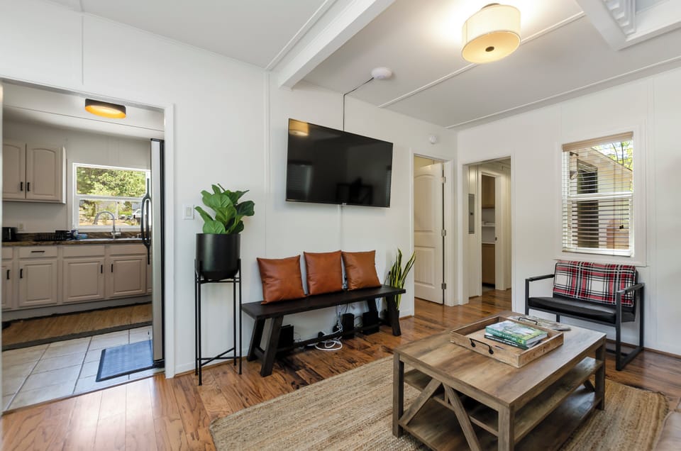 Family Cabin | Living area | 50-inch TV with cable channels, fireplace