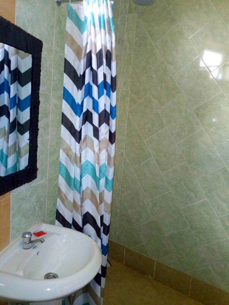 Standard Double Room | Bathroom | Shower, slippers, towels, soap