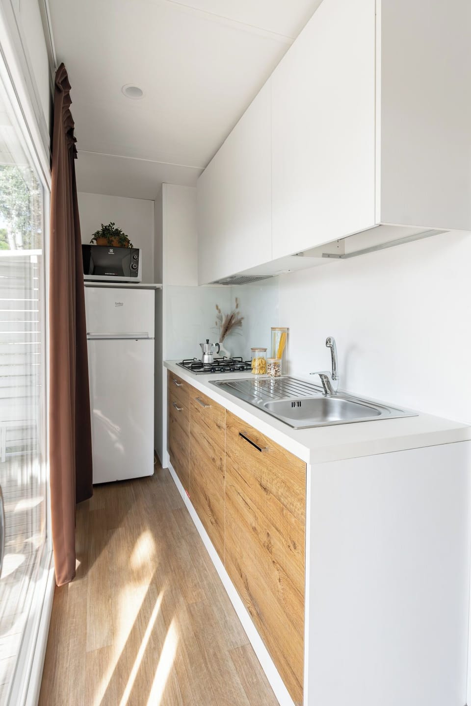 Lodge Deluxe Family | Private kitchen | Fridge, stovetop, cookware/dishes/utensils