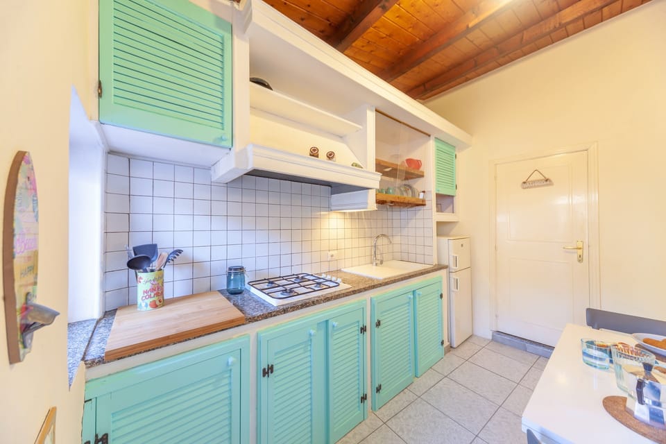 Apartment, 2 Bedrooms | Private kitchen | Full-size fridge, microwave, stovetop, cookware/dishes/utensils
